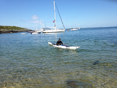 Cheri demonstrates rolling in her kayak.